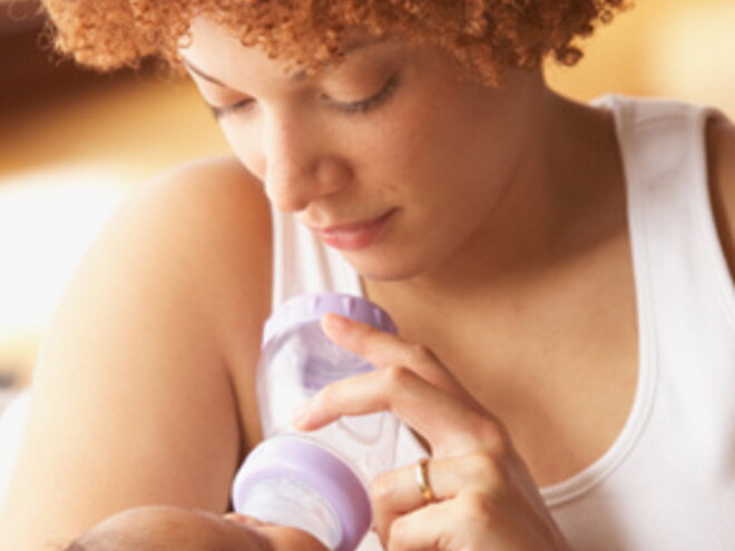 Mom feeding baby Mom feeding baby